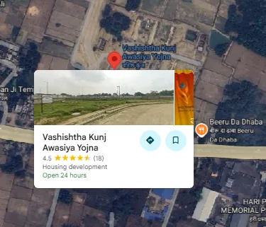 Google Maps satellite view of the Vashishtha Kunj Awasiya Yojna pin on the Lucknow-Ayodhya road (NH-27), as our research analyst gives it