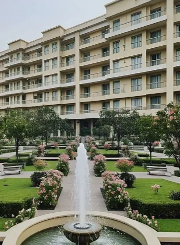 An illustration of a fountain garden in front of an apartment block. Not a photo of the site