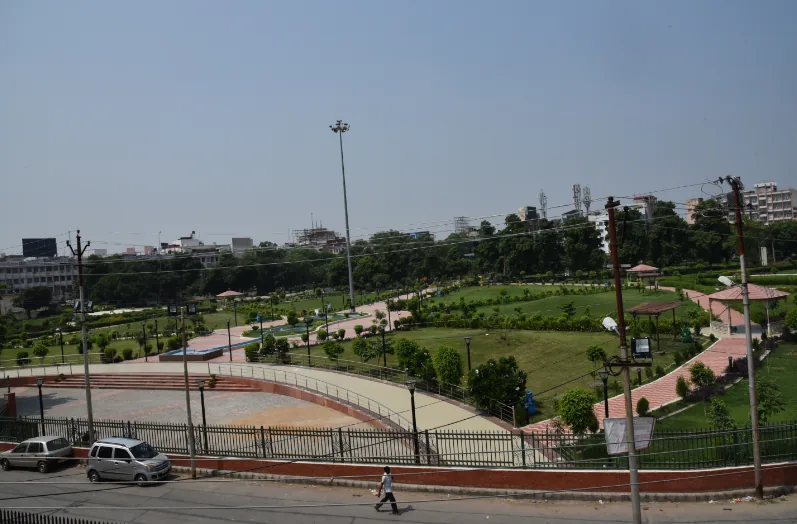 A fenced public park with lawns and walkways, from our research analyst's form. She does not say where it was taken