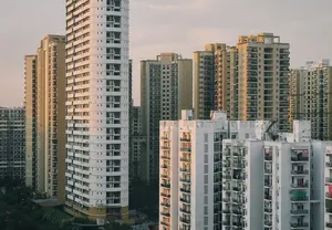 Tall buildings with a crane, Noida