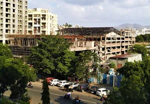 Construction in progress of an auditorium near Sinhgad Road, Pune.jpg