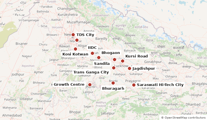 Map of the 13 places UPSIDA sells in under this scheme: IIDC Etah, Trans Ganga City, TDS City, EPIP Kasna, Kursi Road, Saraswati Hi-Tech City, Bhogaon, Spinning Mill, Sandila, Growth Centre Jhansi, Kosi Kotwan, Bhuragarh, Jagdishpur
